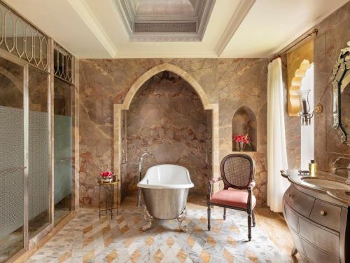 Rajmata Two-Bedroom Presidential Suite with Pool: Airport Transfers in luxury vehicle, 01 Bottle of champagne, INR 5000 hotel credit once during the stay. One 60-minute spa therapy for couple, Evening Hi-Tea at Safir/ Sundowner session with Bartender for
