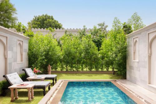 Princess One King Bedroom Suite with Pool: Airport Transfers in luxury vehicle, INR 5000 hotel credit once during the stay. One 60-minute spa therapy for couple. Evening Hi-Tea / Sundowner with Bartender for 1 hour, Butler & 30% off on Property Services