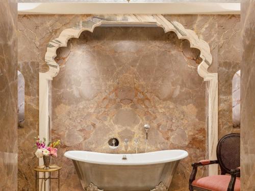 Princess One King Bedroom Suite with Pool: Airport Transfers in luxury vehicle, INR 5000 hotel credit once during the stay. One 60-minute spa therapy for couple. Evening Hi-Tea / Sundowner with Bartender for 1 hour, Butler & 30% off on Property Services