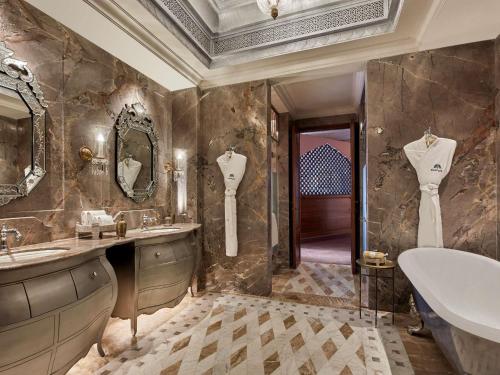 Signature One King Bedroom Suite: Airport Transfers, 01 Bottle of wine, INR 3000 hotel credit once during the stay. Book for two nights and receive one 60-minute spa therapy for one person. 20% savings on hotel services.