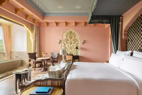 Signature One King Bedroom Suite: Airport Transfers, 01 Bottle of wine, INR 3000 hotel credit once during the stay. Book for two nights and receive one 60-minute spa therapy for one person. 20% savings on hotel services.