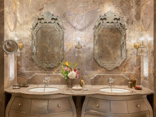 Maharani One King Bedroom Royal Suite with Pool: Airport Transfers in luxury vehicle, 01 Bottle of wine, INR 5000 hotel credit once during the stay. One 60-minute couple spa therapy. Evening Hi-Tea / Sundowner with Bartender, Butler Service