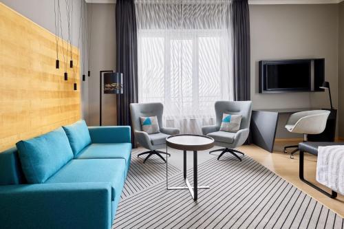 Superior Guest Room with Sofa Bed and Courtyard View