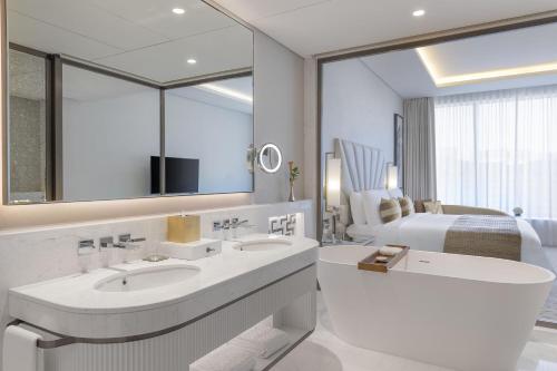 Deluxe King Room with City View, KYMA beach access, Signature St. Regis Butler Service