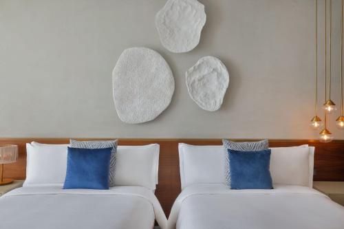 Deluxe Double Room with Two Double Beds and Canal View including Signature St. Regis Butler Service
