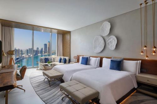 Family Room with Canal View including Signature St. Regis Butler Service