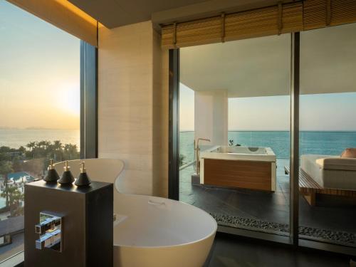 Three-Bedroom Presidential Suite - Dedicated butler, breakfast at Alizee or in-room dining, daily sunset Aperitivo served in the suite, and a round-trip airport transfer with Complimentary Rainforest Experience once per stay