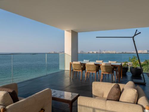 Three-Bedroom Presidential Suite - Dedicated butler, breakfast at Alizee or in-room dining, daily sunset Aperitivo served in the suite, and a round-trip airport transfer with Complimentary Rainforest Experience once per stay