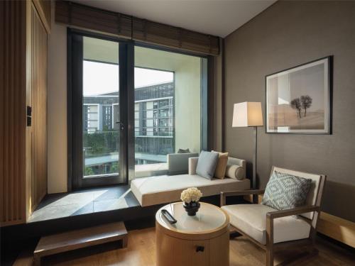 Family Room , Two interconnecting rooms with 2 balconies and 2 bathrooms