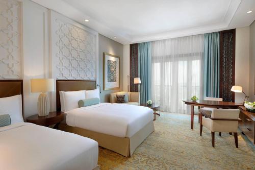 Family room, Bedroom 1: 1 King Bed, Bedroom 2: 2 Queen Beds, Connecting Rooms, 2 Balconies