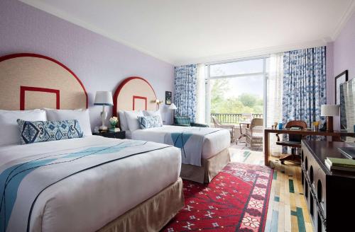 Graduate Queen Room with Two Queen Beds and Balcony