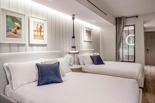 Deluxe Queen Room with Two Queen Beds and Balcony