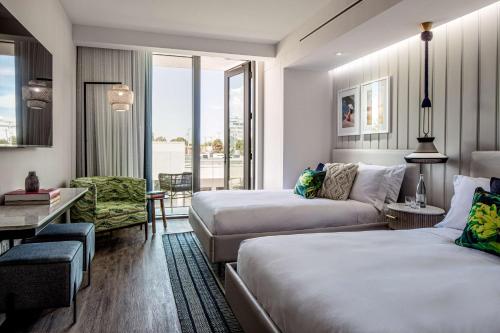 Queen Room with Two Queen Beds and Balcony - Hearing Accessible