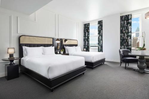 Deluxe Queen Room with Two Queen Beds and City View