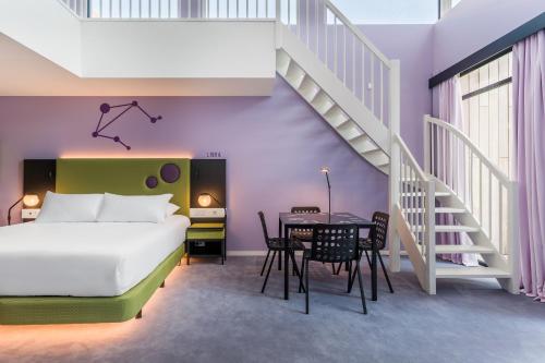 Family duplex room with terrace (only to be booked by 2 adults with children)