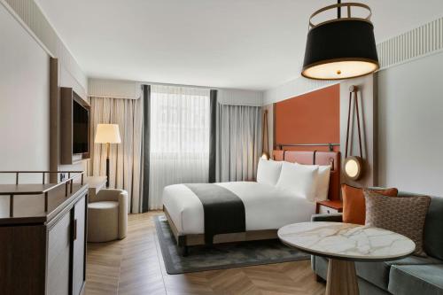 Deluxe Family Room with King Bed and Sofa Bed