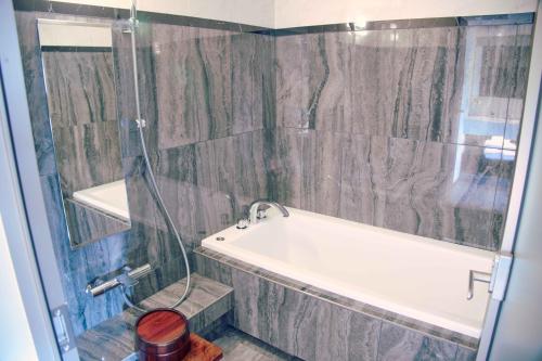 Marufukuro Suite with Private Sauna ,Terrace and Lounge Access - designed by Tadao Ando