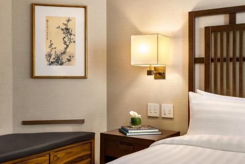 One-Bedroom Deluxe Suite with Balcony and Sofa
