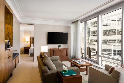 One-Bedroom Deluxe Suite with Balcony and Sofa