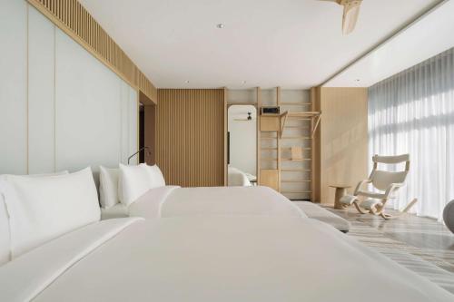 SIRO Premium Double Queen, complimentary AED 200 daily recovery credit and lifestyle consultation