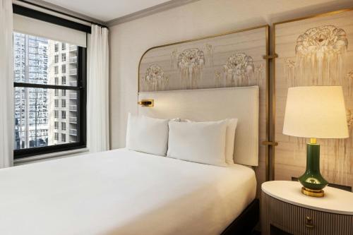 Deluxe Room with Two Queen Beds, Roll-In Shower and City View - Mobility and Hearing Accessible