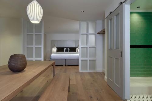 One-Bedroom King Suite with Sofa Bed and City View