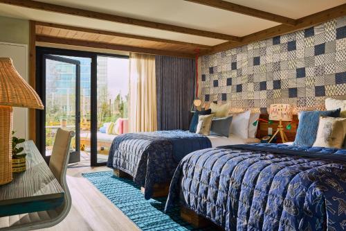 Two Queen Beds with Patio or Balcony