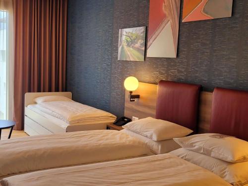 Family room with one double bed and one extra bed