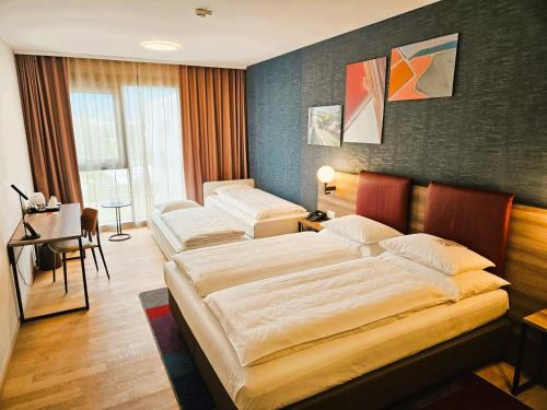 Family room with one double bed and one extra bed