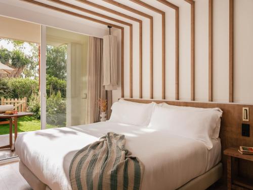 Superior ME + Junior Suite with Garden