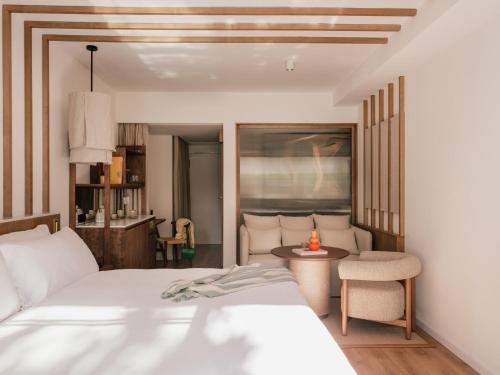 Superior ME + Junior Suite with Garden