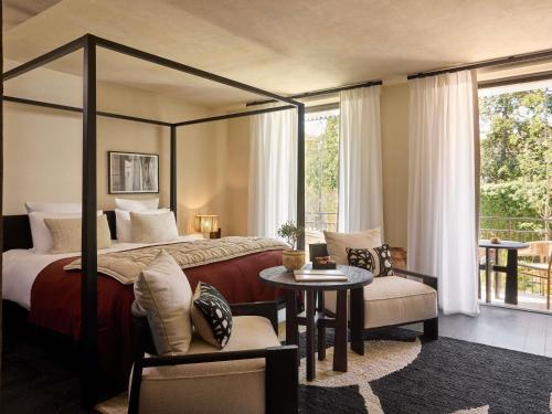 Junior King Suite with Balcony and Pool View