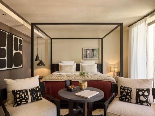 Junior King Suite with Balcony and Pool View