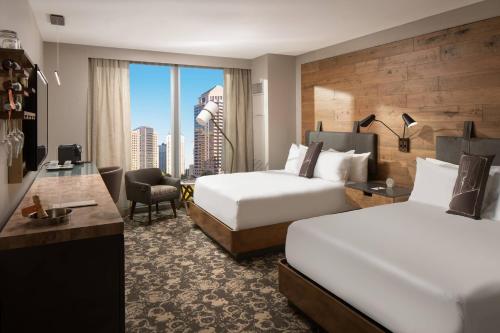 Guest room, 2 Queen,  City View Mobility &amp; Hearing Accessible w/ Roll-in Shower)