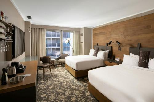 Queen Room with Two Queen Beds and City View - Hearing Accessible