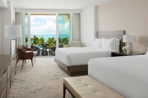 Deluxe Guest Room with 2 Queen, Partial Ocean view Balcony