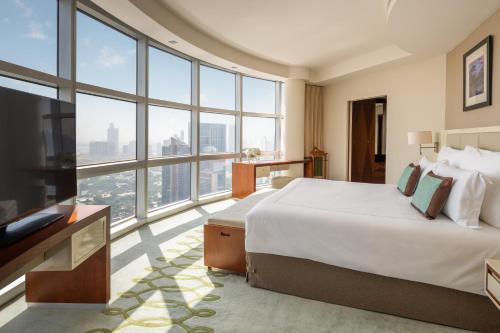 Executive Suite with Panoramic Skyline Views, Airport Transfers, Direct Connectivity to Museum of The Future, Complimentary Breakfast, Signature Afternoon Tea, Evening Sundowners, Soft Refreshments and Canapes