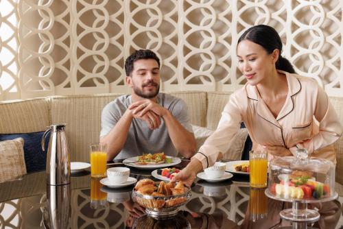 Executive Suite with Panoramic Skyline Views, Airport Transfers, Direct Connectivity to Museum of The Future, Complimentary Breakfast, Signature Afternoon Tea, Evening Sundowners, Soft Refreshments and Canapes
