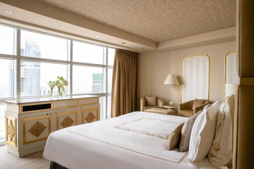 Presidential Suite with Panoramic Skyline Views, Airport Transfers, Direct Connectivity to Museum of The Future, Complimentary Breakfast, Signature Afternoon Tea, Evening Sundowners, Soft Refreshments and Canapes