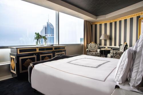 Presidential Suite with Panoramic Skyline Views, Airport Transfers, Direct Connectivity to Museum of The Future, Complimentary Breakfast, Signature Afternoon Tea, Evening Sundowners, Soft Refreshments and Canapes
