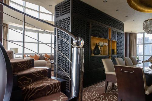 Royal Suite with Panoramic Skyline Views, Airport Transfers, Direct Connectivity to Museum of The Future, Complimentary Breakfast, Signature Afternoon Tea, Evening Sundowners, Soft Refreshments and Canapes