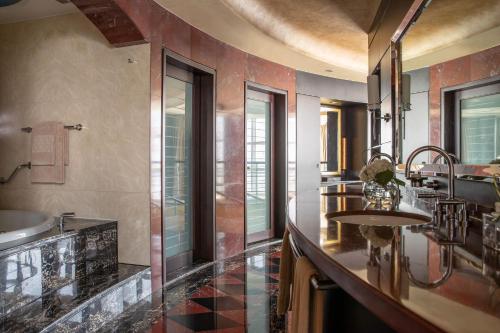 Royal Suite with Panoramic Skyline Views, Airport Transfers, Direct Connectivity to Museum of The Future, Complimentary Breakfast, Signature Afternoon Tea, Evening Sundowners, Soft Refreshments and Canapes