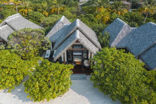 Beach Villa - Personalized Butler Service | Private Sea Plane Lounge Access | Kids Club with Optional Nanny Services | Maldivian Traditional Village Experience | Access to 5 Exceptional Dine-Around Outlets