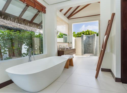 Sunset Pool Beach Villa - Personalized Butler Service | Private Sea Plane Lounge Access | Kids Club with Optional Nanny Services | Maldivian Traditional Village Experience | Access to 5 Exceptional Dine-Around Outlets