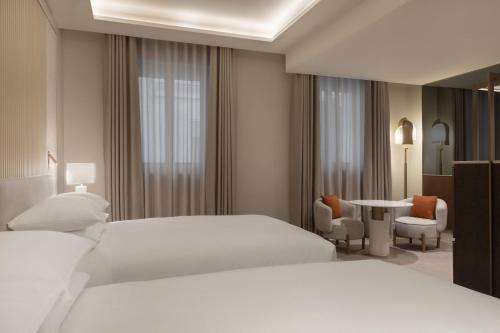 Deluxe Queen Room with Two Queen Beds and Courtyard View