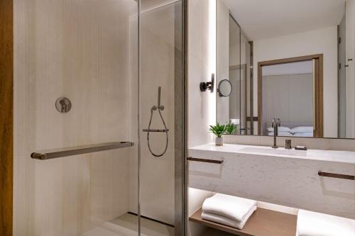 Deluxe Queen Room with Two Queen Beds and Courtyard View