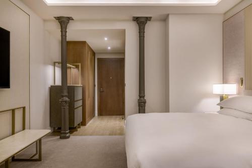 Premium Deluxe King Room with Balcony and City View