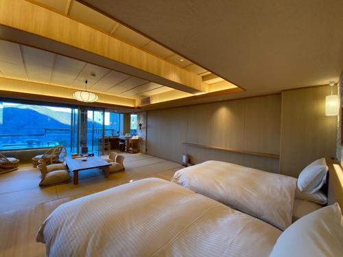 Suite with Tatami Area with Open-Air Bath - (ZEN/ SEN/ SHIN/ EN)