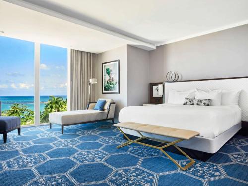 One-Bedroom King Suite with Ocean View and Sofa Bed
