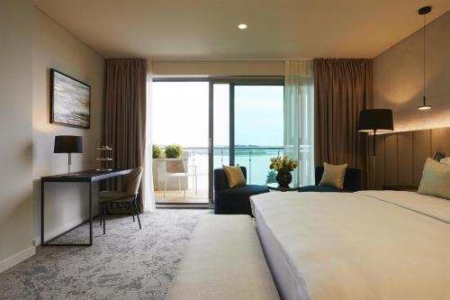 Grand Deluxe with Terrace Sea View and Extra bed (2 Adults + 1 Child)